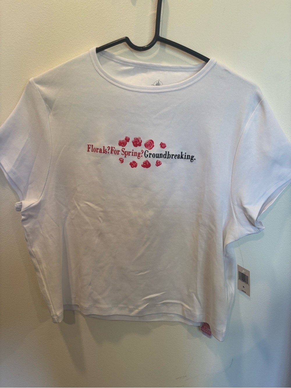 Disney White Short Sleeve Tee with Pink Floral Graphic. Disney Devil Wears Prada